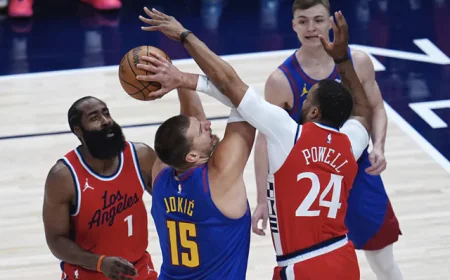 Nuggets rout Clippers to advance in NBA playoffs