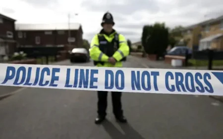 UK police release 14 children held after boy dies in fire