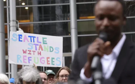 Judge orders Trump to admit 12,000 refugees into US