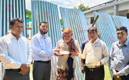Relief Aid Distributed in C'nawabganj: CI Sheets, Cash, and Dry Food Provided
