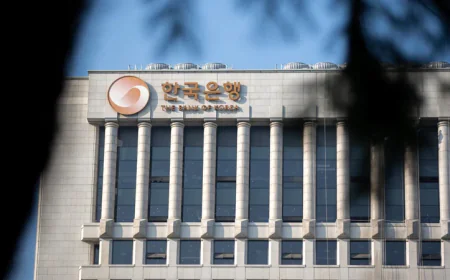 Bank of Korea Lowers Rate and Growth Outlook as Economy Faces Headwinds