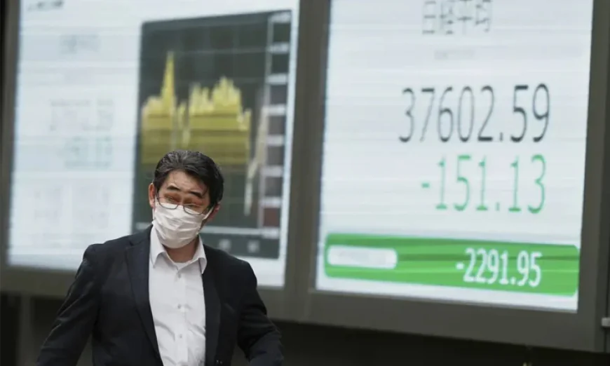 Asian Markets Rally as Wall Street Gains and China Cuts Rates
