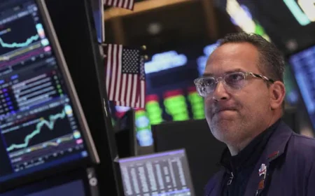 US Stocks Slip from Record Highs as Tariff Fears Resurface