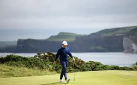 Harman Leads British Open, McIlroy Five Shots Back