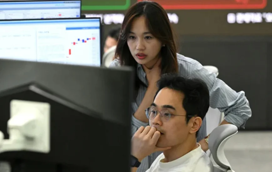 Stocks Slip as New Tariffs Overshadow Strong Earnings Reports