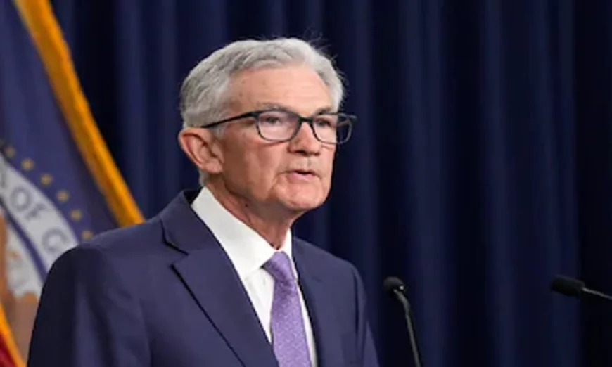 Dow Sets New Record as Fed Chair Hints at Rate Cut