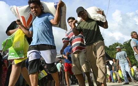 Indonesians scramble for food and supplies after devastating floods
