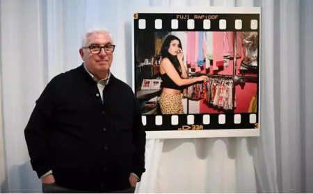 Amy Winehouse's father sues friends over auction of her clothes