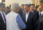 Prof Yunus exchanges greetings with PM