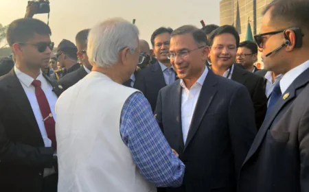 Prof Yunus exchanges greetings with PM