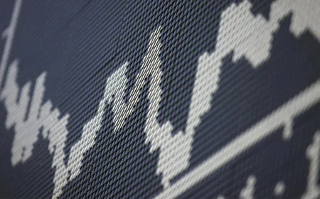 Asian markets mixed as traders weigh AI and tariffs outlook