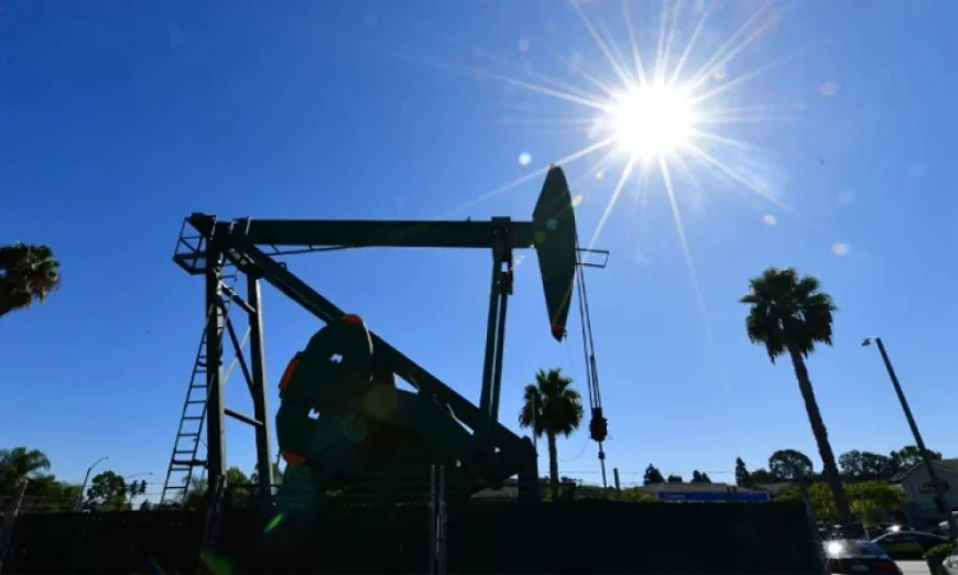 Oil falls on Iran optimism, metals slide as dollar strengthens