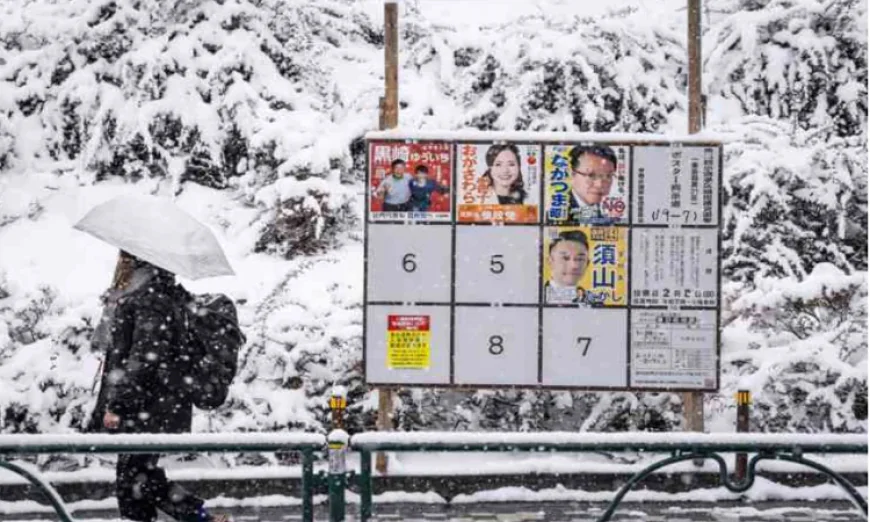 Japan votes in snow-hit snap polls as Takaichi eyes strong mandate