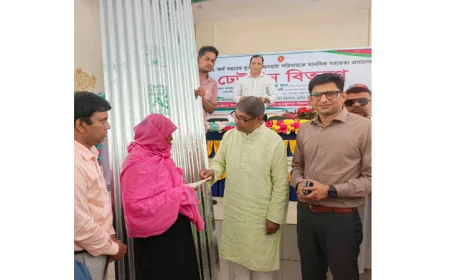 Money, CI sheet distributed among poor families in Tangail