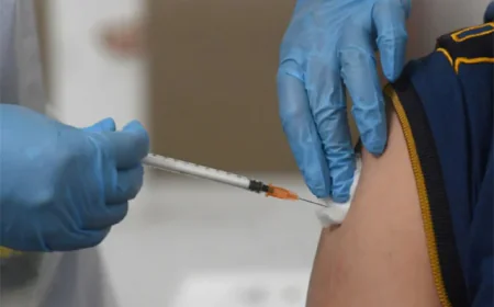 US judge halts implementation of Trump vaccine overhaul