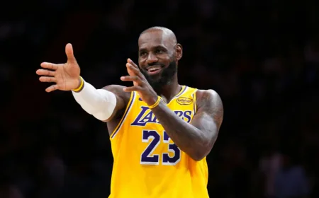 James ties NBA record for most regular-season games in latest milestone