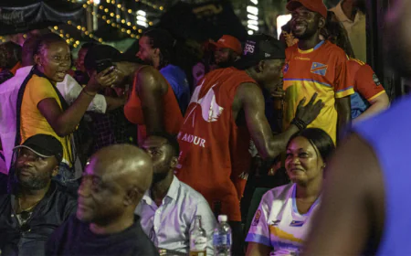 DR Congo fans dance in the rain after sealing World Cup spot