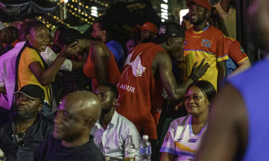 DR Congo fans dance in the rain after sealing World Cup spot