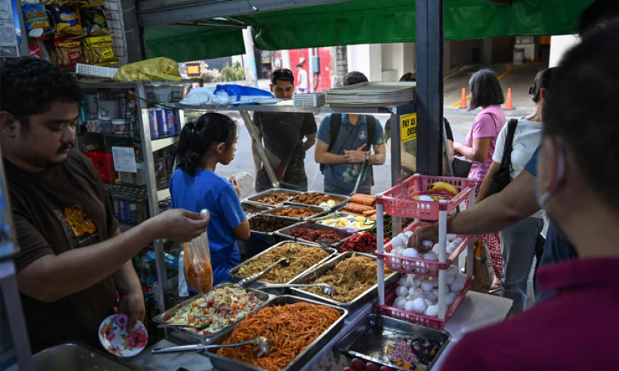 Mideast war takes a bite out of Filipino street food vendors