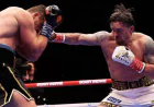Usyk rocked before stopping Verhoeven to retain heavyweight belts