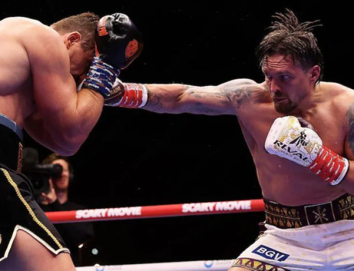Usyk rocked before stopping Verhoeven to retain heavyweight belts