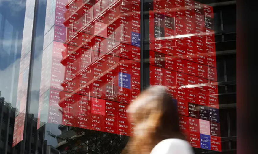 Asian Markets Slide Amid U.S. Losses and Iran Tensions