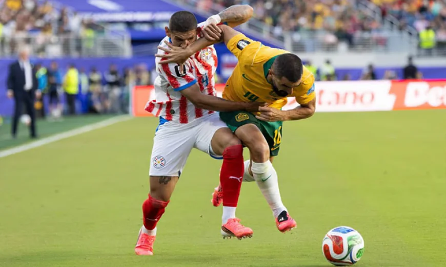 Australia Reach World Cup Last 32 After Draw with Paraguay