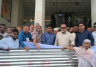 CI sheets, cash aid distributed among 60 disaster-hit families in Gopalganj