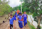 Young students have to carry two  Sets of clothes & pants to school