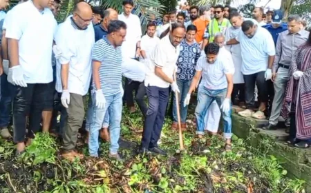 State Minister Tuku takes to  Field to clean up the swamp