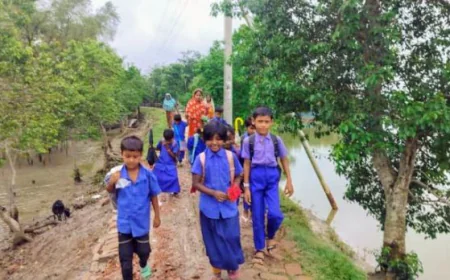 Young students have to carry two  Sets of clothes & pants to school