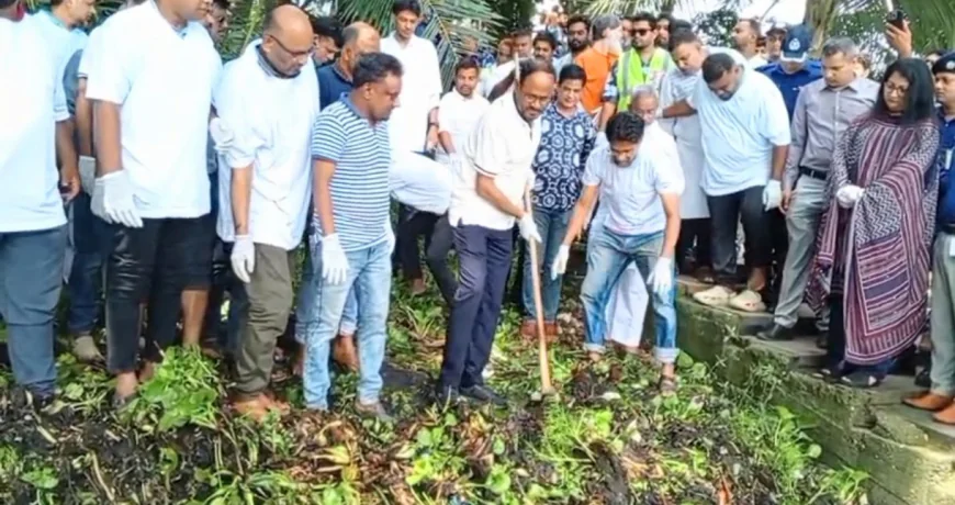 State Minister Tuku takes to  Field to clean up the swamp