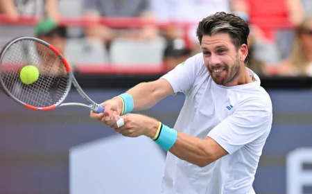 Norrie saves match point to stun de Minaur