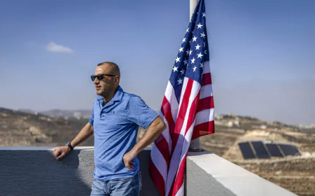 Palestinian-American Raises US Flag at Home Besieged by Settlers