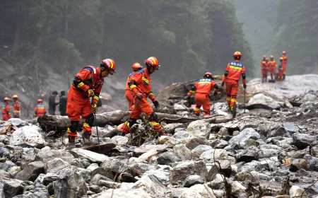 Nepal lays victims to rest as rescuers search for thousands still missing