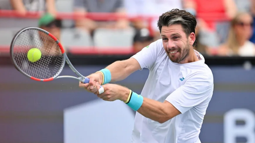 Norrie saves match point to stun de Minaur