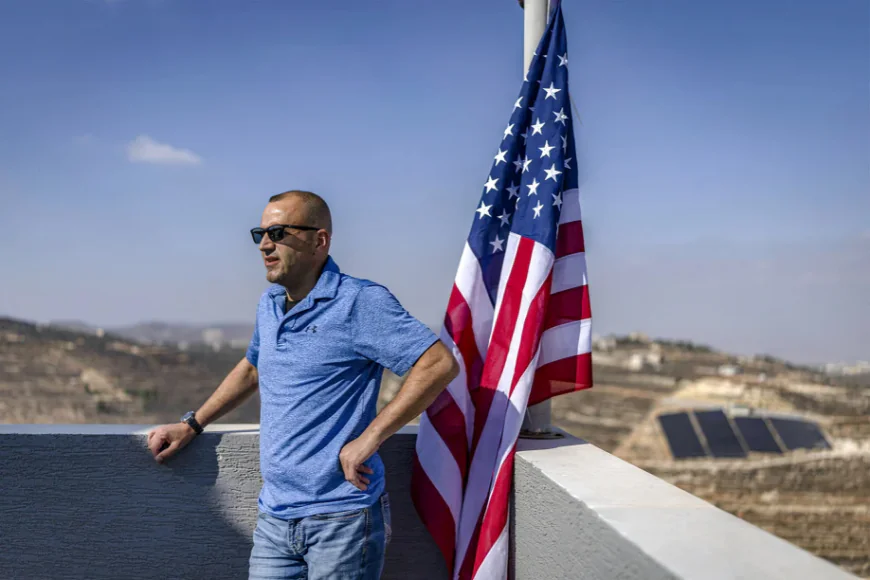 Palestinian-American Raises US Flag at Home Besieged by Settlers