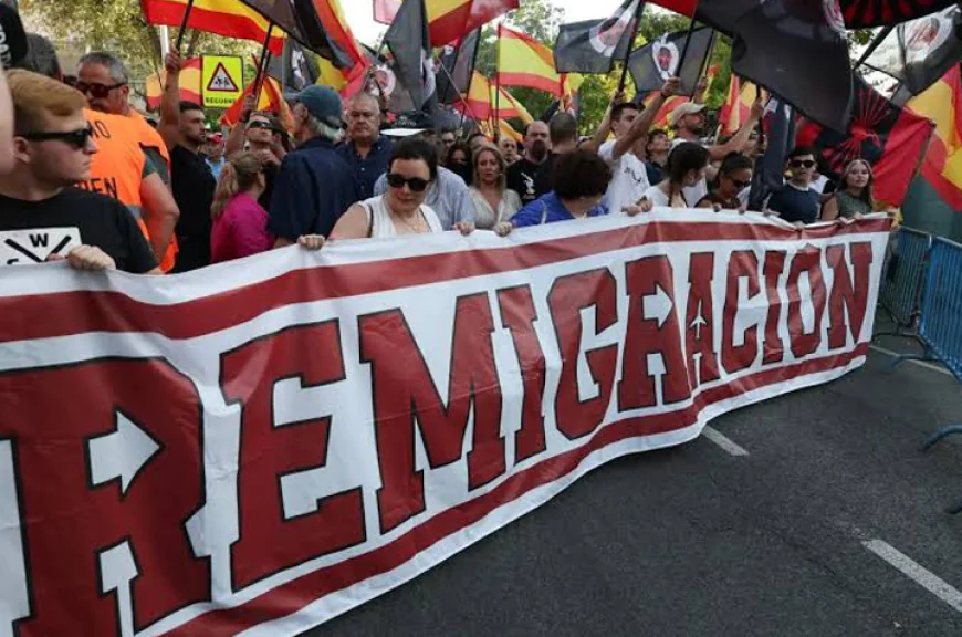 Spain urges calm after anti-migrant protests clash with police
