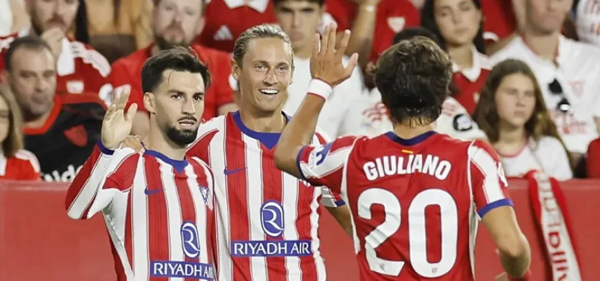 Atletico beat Sevilla to move top of La Liga