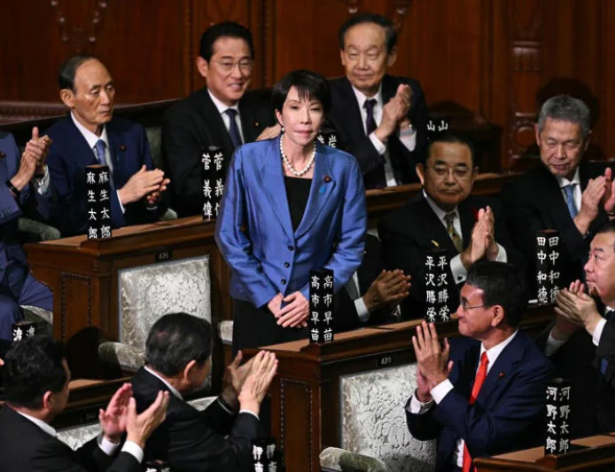 Japan to ease overtime rules under workaholic PM