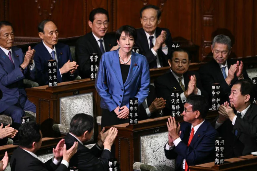 Japan to ease overtime rules under workaholic PM