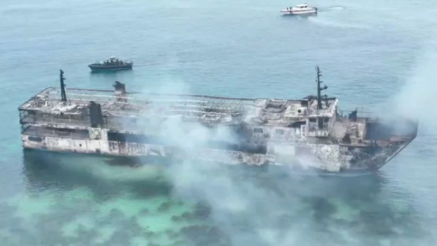 Philippine Coast Guard battles smoke in search for missing ferry fire victims