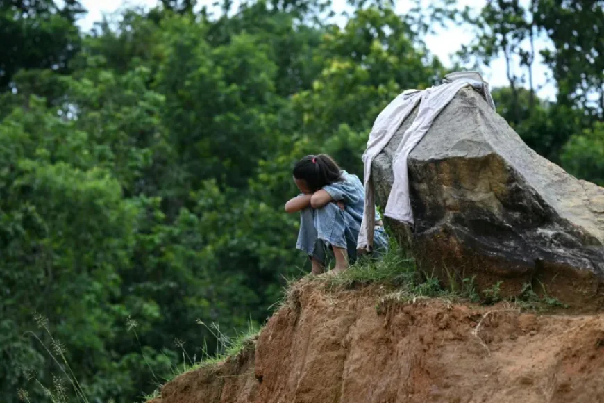 Children in flood-hit Nepal struggle with loss and cling to hope