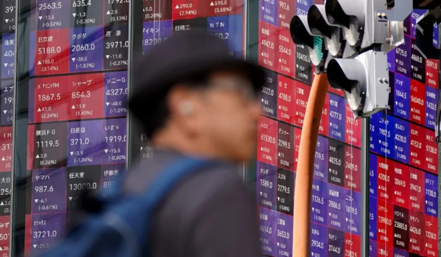 Asian stocks slip as traders await Fed decision