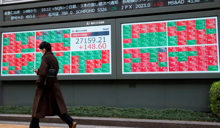 Global stocks mixed as yen falls despite Bank of Japan rate hike
