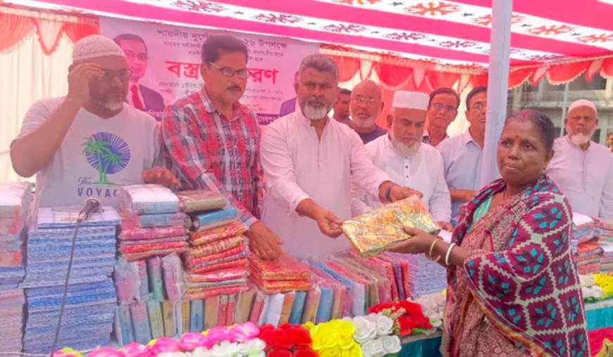 Sarees and lungis distributed among underprivileged people in Naogaon