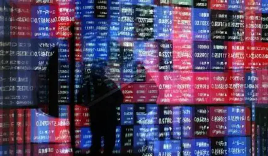 Stocks slide as investors brace for tech earnings and central bank decisions